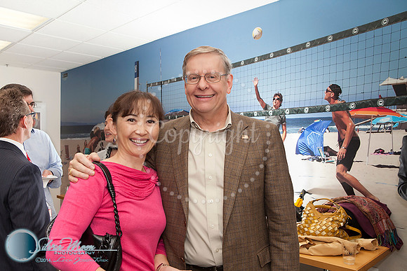 Ribbon Cutting for Jay McDowell. My Photos on walls.