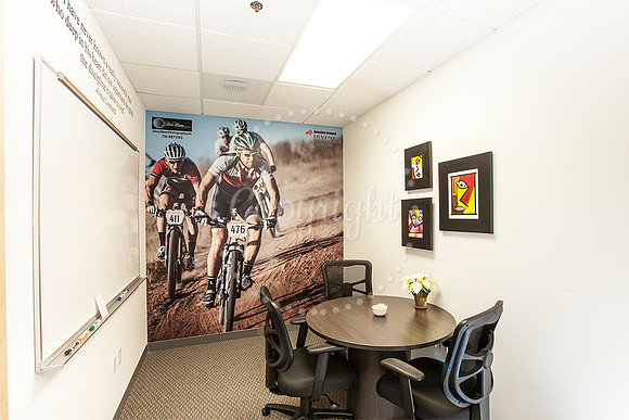 Ribbon Cutting for Jay McDowell. My Photos on walls.