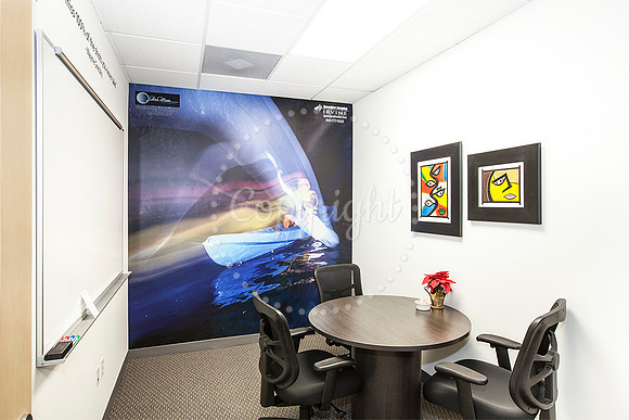Ribbon Cutting for Jay McDowell. My Photos on walls.